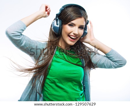 Young Woman With Headphones Listening Music .Music Teenager Girl Dancing Against Isolated White Background