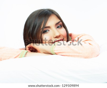 Woman bed portrait. Female model lying in bed. Close up smiling face .