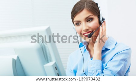 Portrait of woman customer service worker, call center smiling operator with phone headset. Young female business model.