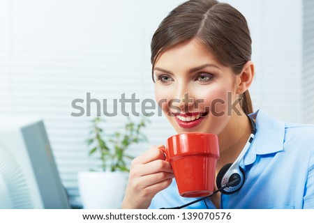 Business woman time out concept, red coffee cup. Break the working day. female business model at office.
