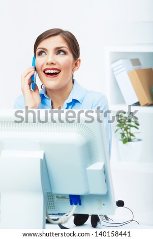 Portrait of happy surprised business woman on phone in white office. Young female model computer working.