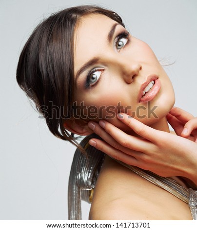 Beauty woman portrait . Isolated female model . Close up face. Hand touching.