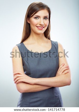 Portrait of young smiling business woman white background isolated. Female model corporate business dressed.