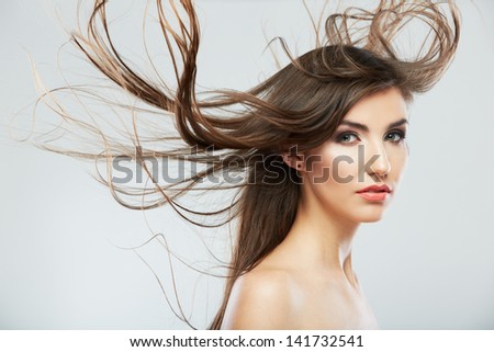 Hair style woman portrait. Female model isolated on white background. Hair in motion.