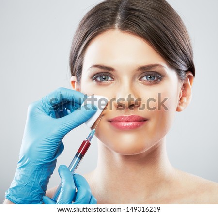 Smiling Beauty Woman face surgery close up portrait. Female model.