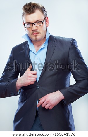 Business man funny portrait. Isolated. Male model.