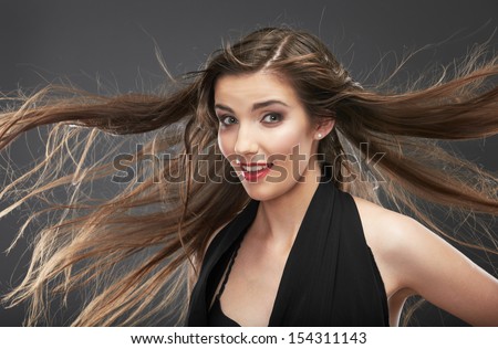 Woman hair style fashion portrait . Wind in hair. isolated. close up female face.