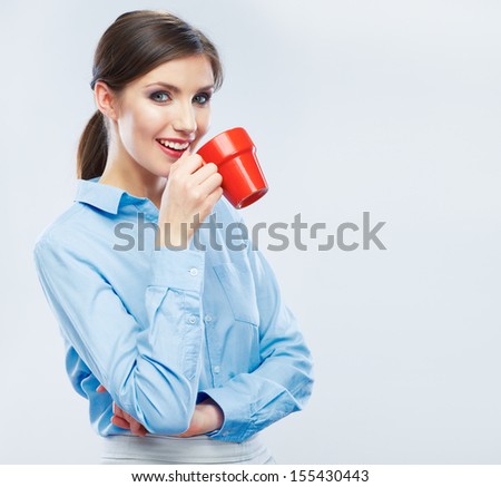 Business woman portrait hold red coffee cup. Female model drink tea.