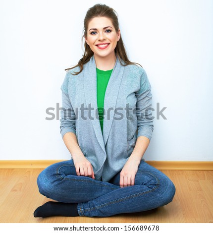Woman natural portrait. Smiling girl at home, indoor portrait. White background isolated.