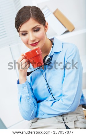 Business woman time out concept, red coffee cup. Break the working day. female business model at office.