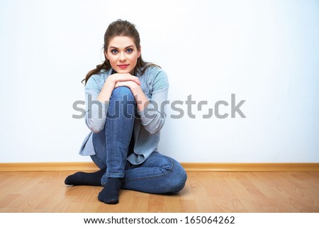 Woman natural portrait. Smiling girl at home, indoor portrait. White background isolated.