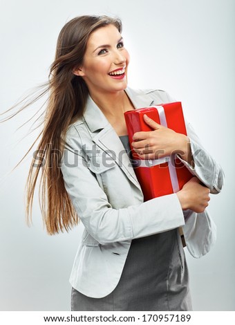 Happy business woman hold  gift. White background isolated