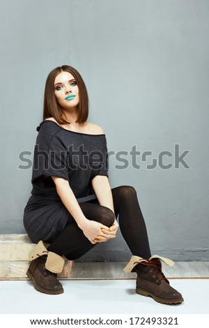 Fashion model girl with straight hair. Woman model.