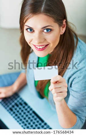 Credit card. Internet shopping of woman. Home portrait.