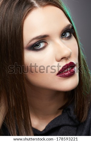 Straight hair style. Close up woman face portrait. Young model.