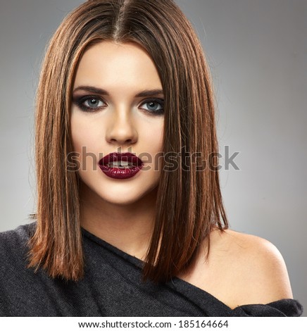 Beautiful model with straight Hair Style. Red lips. Beauty face portrait.
