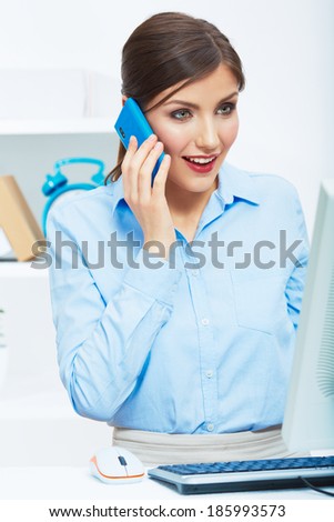 Portrait of happy surprised business woman on phone in white office. Young female model computer working.