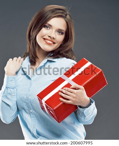 Beautiful girl student hold red gift box. Young business woman.