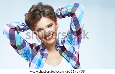 Hipster style woman. Young woman with beautiful smile. Isolated portrait. Casual style.