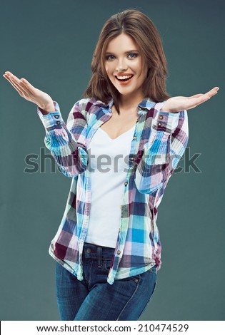 Smiling Woman show empty hand. Isolated portrait of female model.