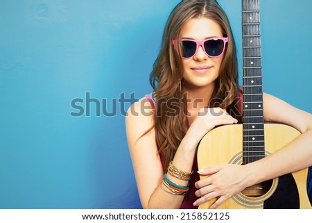 60s style photo of young hippie woman . musician girl