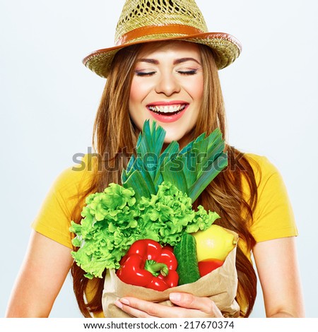 beautiful woman with green food. vegan lifestyle portrait .