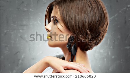 woman face. bob haircut. profile view. beauty face . short hair dress. studio.