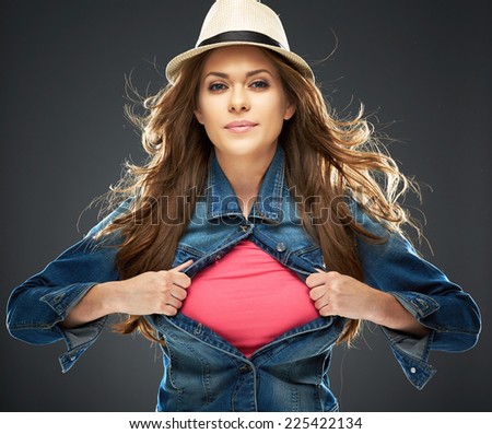 confident woman ripping his clothes for your advertising sign. red copy space.