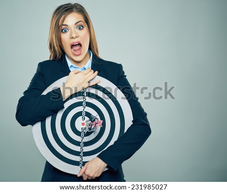 Screaming business woman concept portrait. Business suit dressed woman hold target.