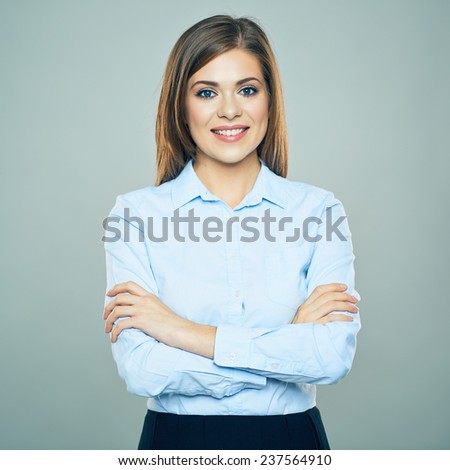 Toothy smiling Business woman crossed arms isolated portrait. Studio isolated