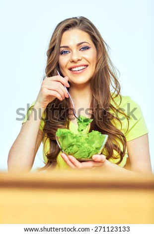 woman eating salad with pleasure. diet with joy emotion.