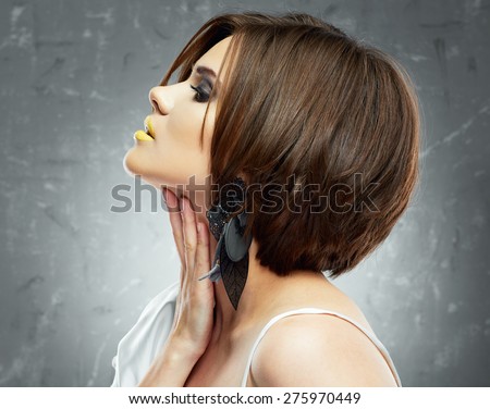 young beauty model with bob haircut. profile view. beauty face . medium hairdress.