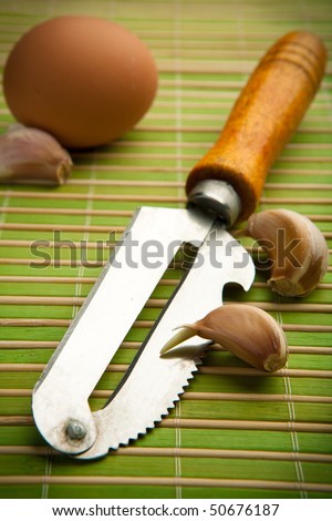 Kitchen devices with wooden handles and egg