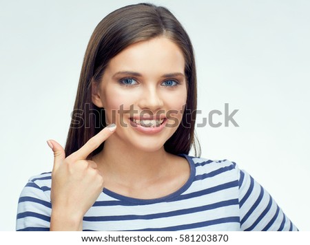 Teenager face portrait with braces. White background isolated portrait.