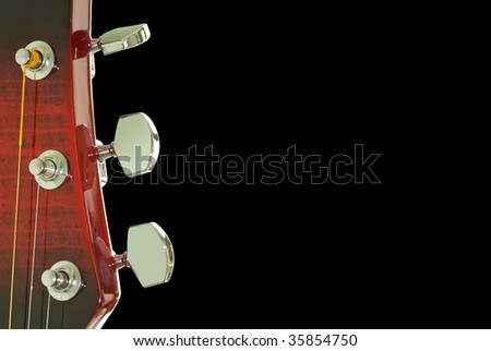 Guitar head. Close up. Isolated on black background with clipping path.