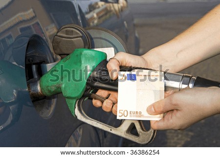 Women in the filling station for filling the tank