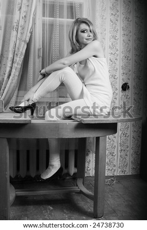black and white woman on a table