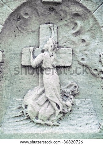 Gravestone detail woman mourning
