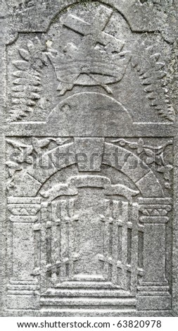 Nineteenth century gravestone detail cross in crown and gates of heaven