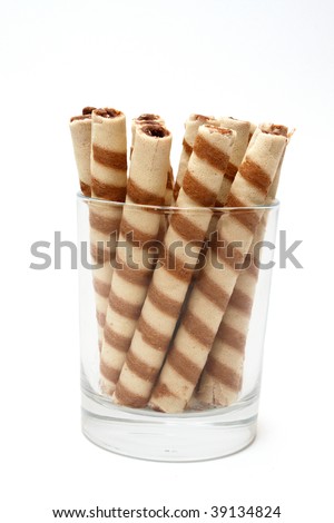 Wafer roll sticks cream rolls in glass