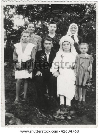 Retro photo. Family portrait at the wedding ceremony. USSR 1940s the 20 th century
