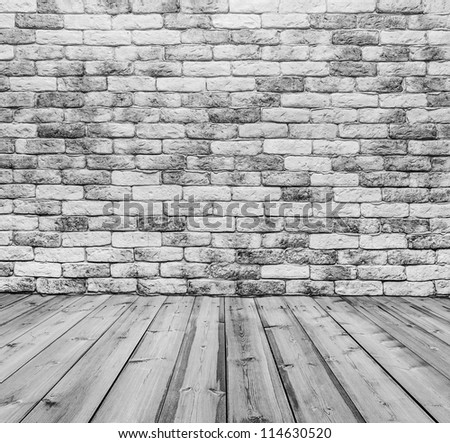 old room with brick wall, black and white background