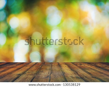 bright background, autumn bokeh and wooden floor