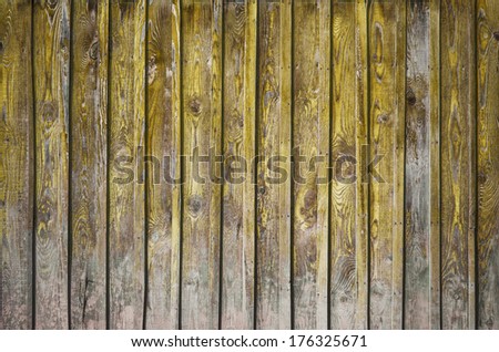 painted old wooden wall. yellow background