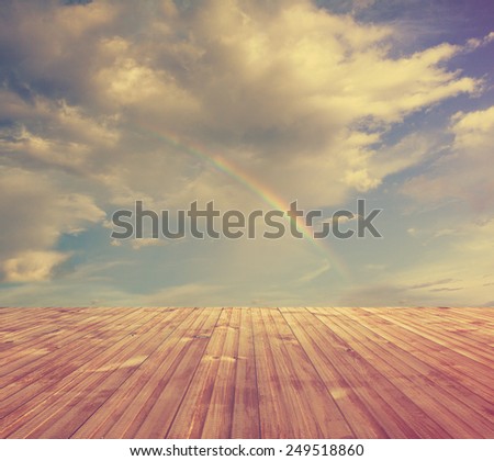 rainbow, sunset sky and wooden floor, background, retro film filtered, instagram style