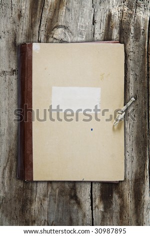 old folder on old wooden background