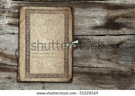old folder isolated on old wooden background