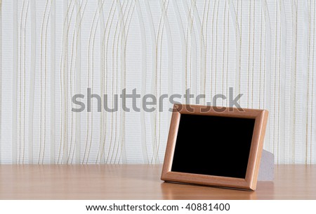 photo frame on wooden table
