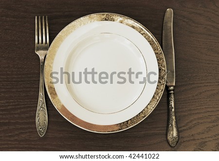 antique fork, knife and plate