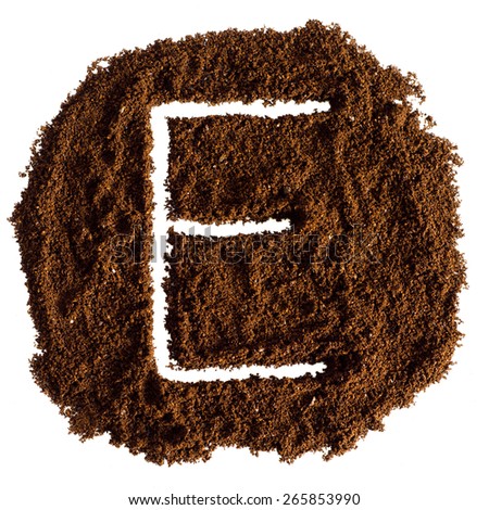 The letter E written on-ground coffee